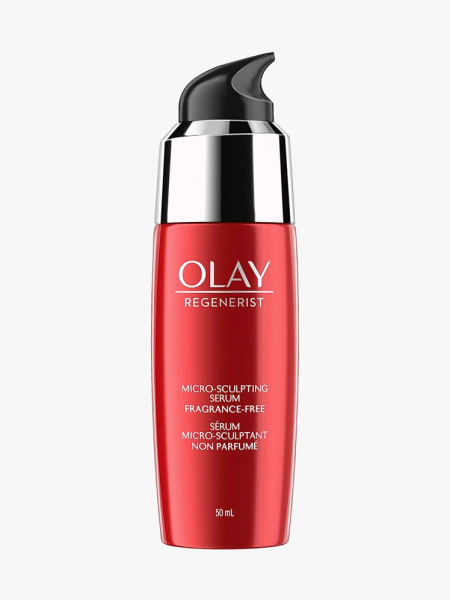 Red bottle of Olay Regenerist Micro-Sculpting Serum with a black cap on a light gray background